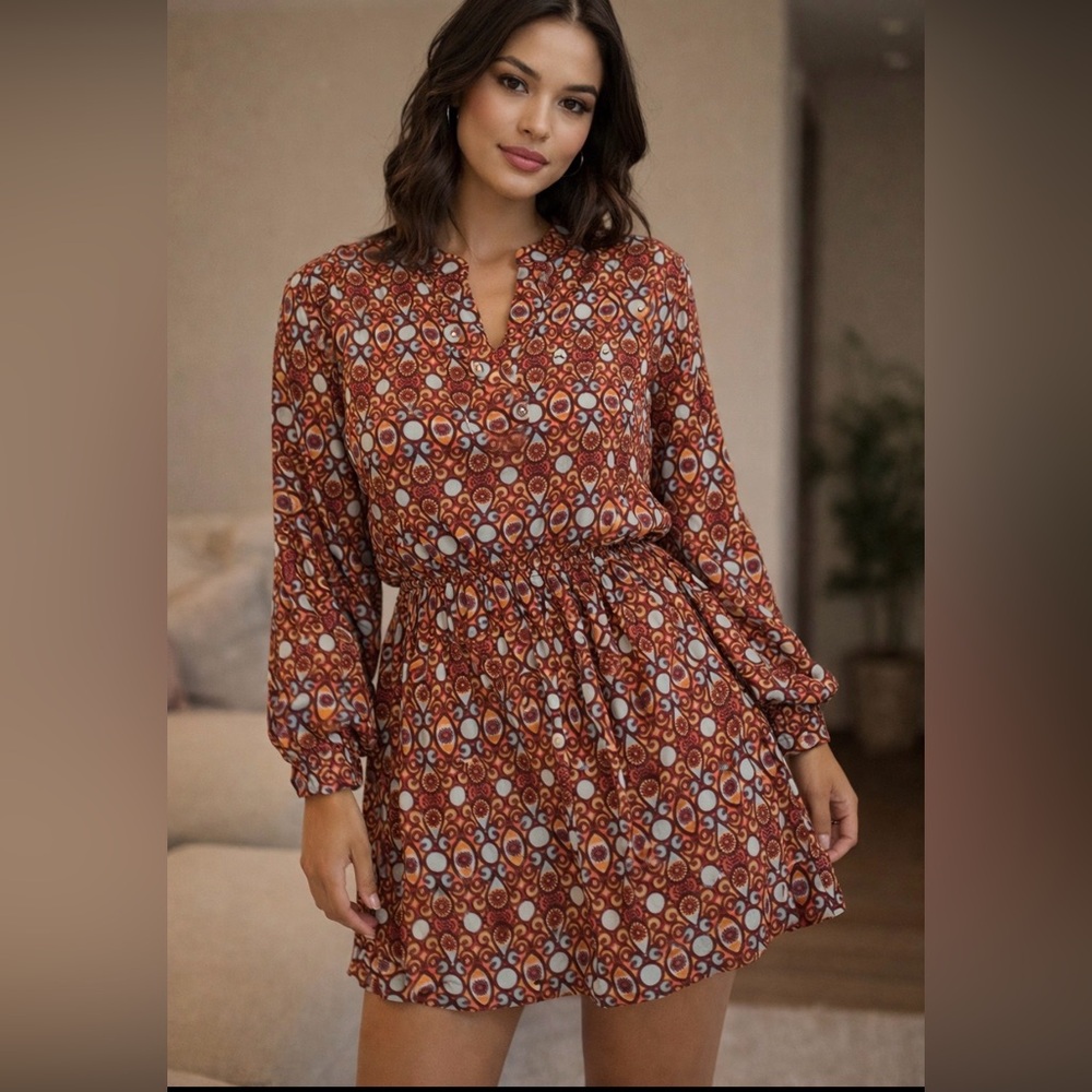 DRESSIN GAUDY AZTEC PRINT TOP SIZE:M THIS TOP IS OVERSIZED STRETCHY TEAL & RUST